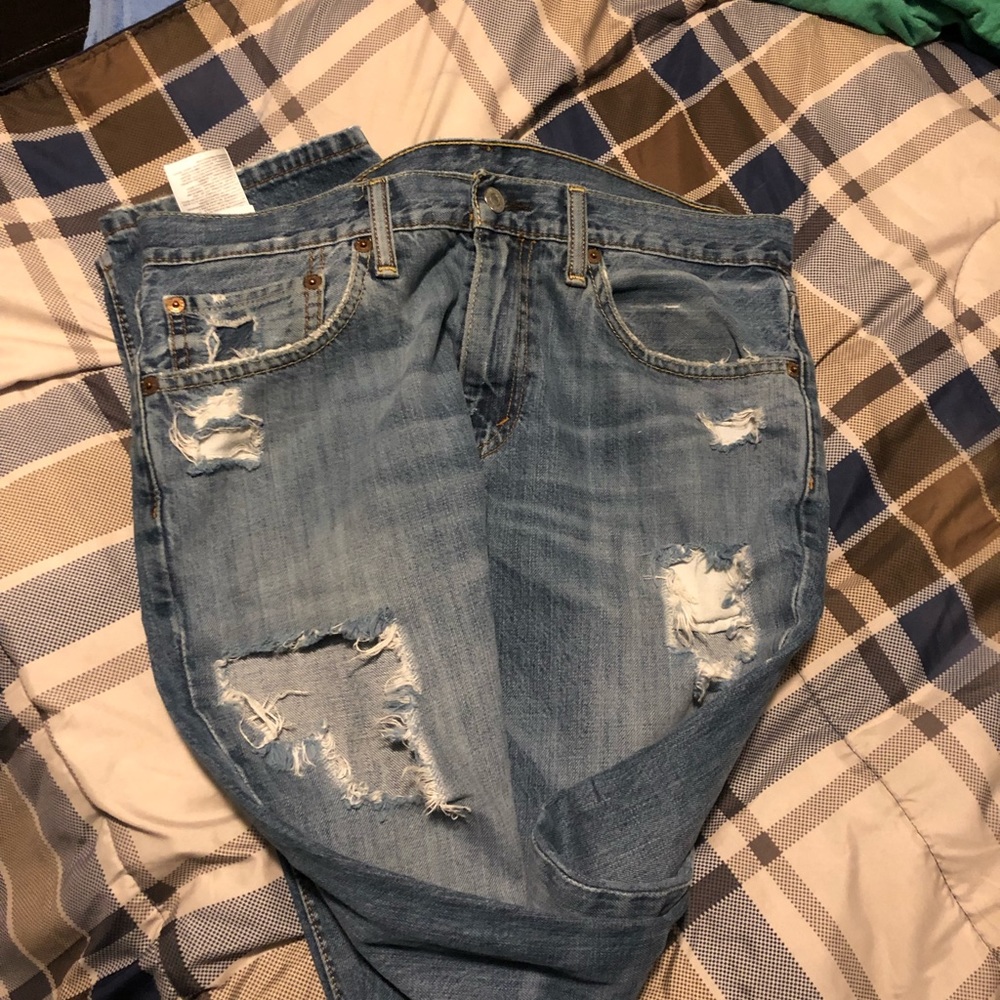 Levi 511 ripped jeans